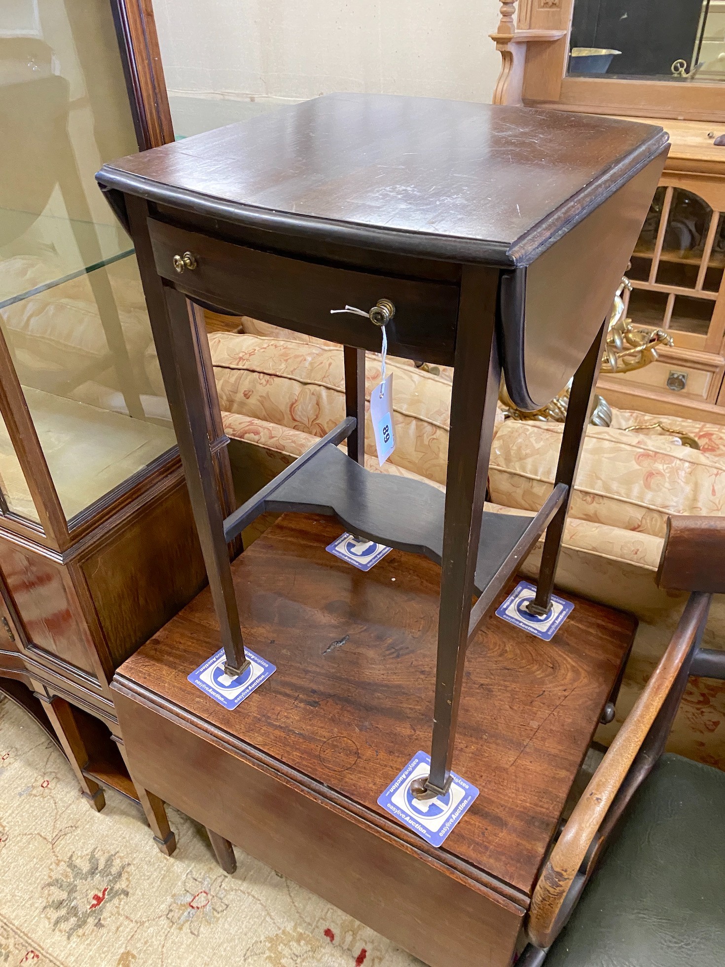 An early Victorian provincial mahogany elbow chair, and Edwardian drop flap table and a Provincial Pembroke table (cut down)